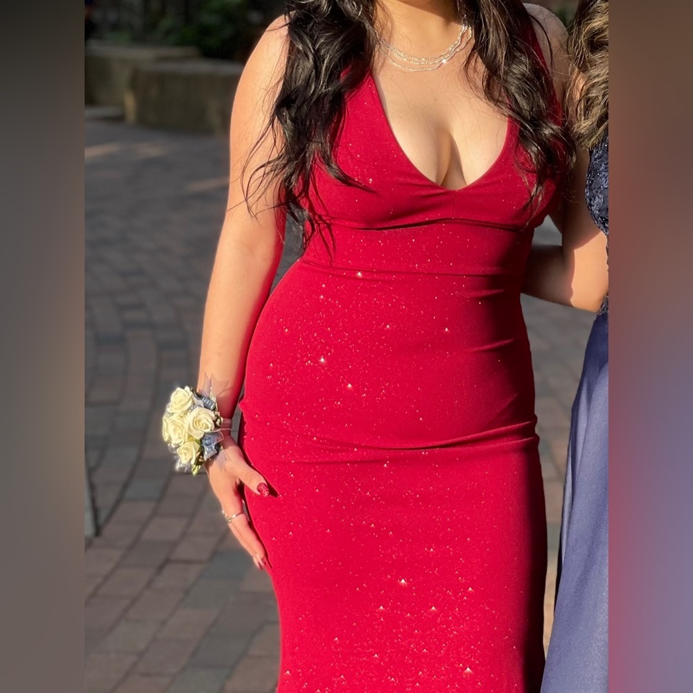 Red body con shimmery dress.